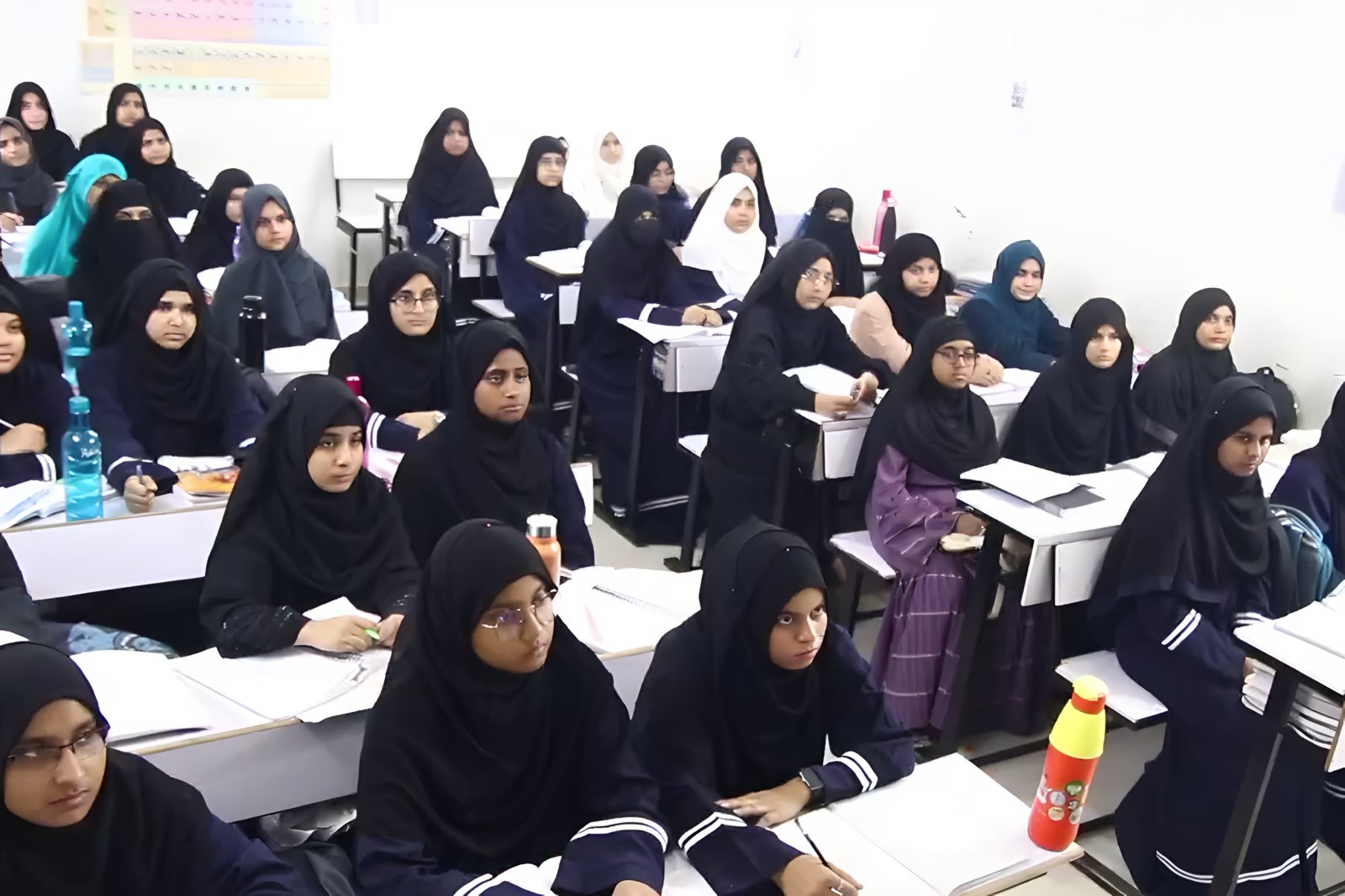 Students learning together in class